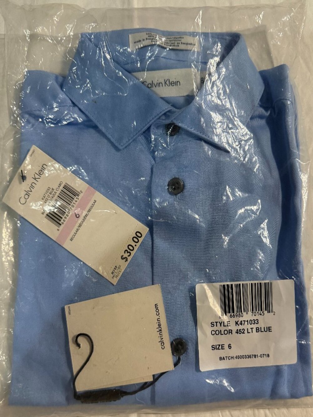 NWT - Calvin Klein - boys blue dress shirt, size 6
